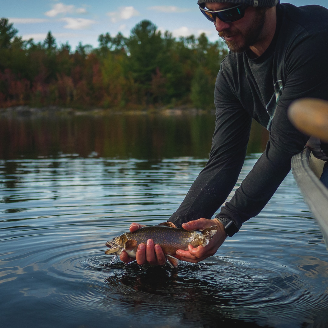 Man fishing for Trout Near Montreal